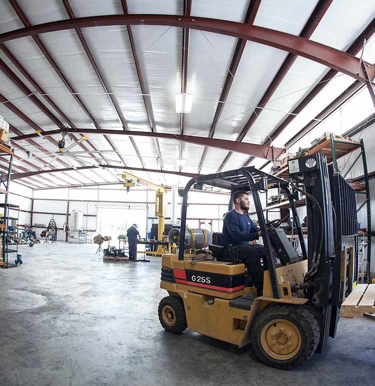 Guy driving forklift