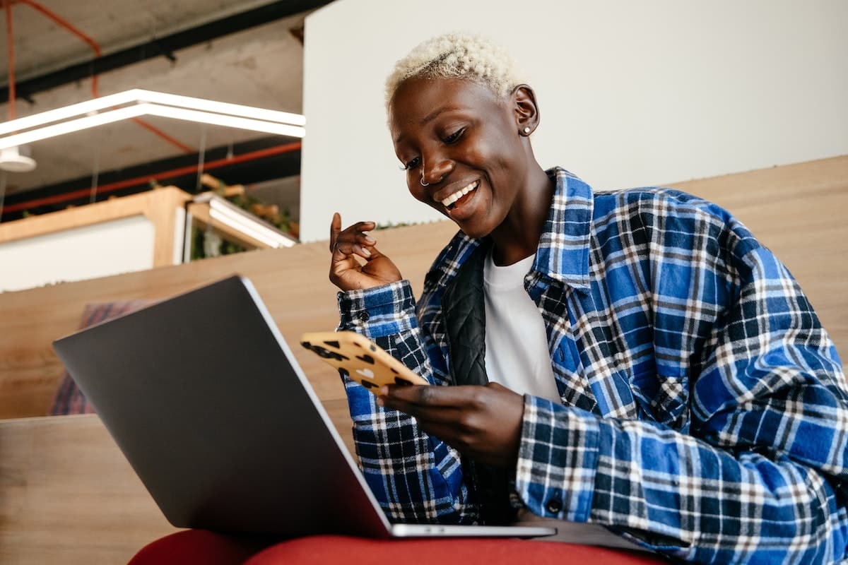 Woman using ChatGPT on laptop